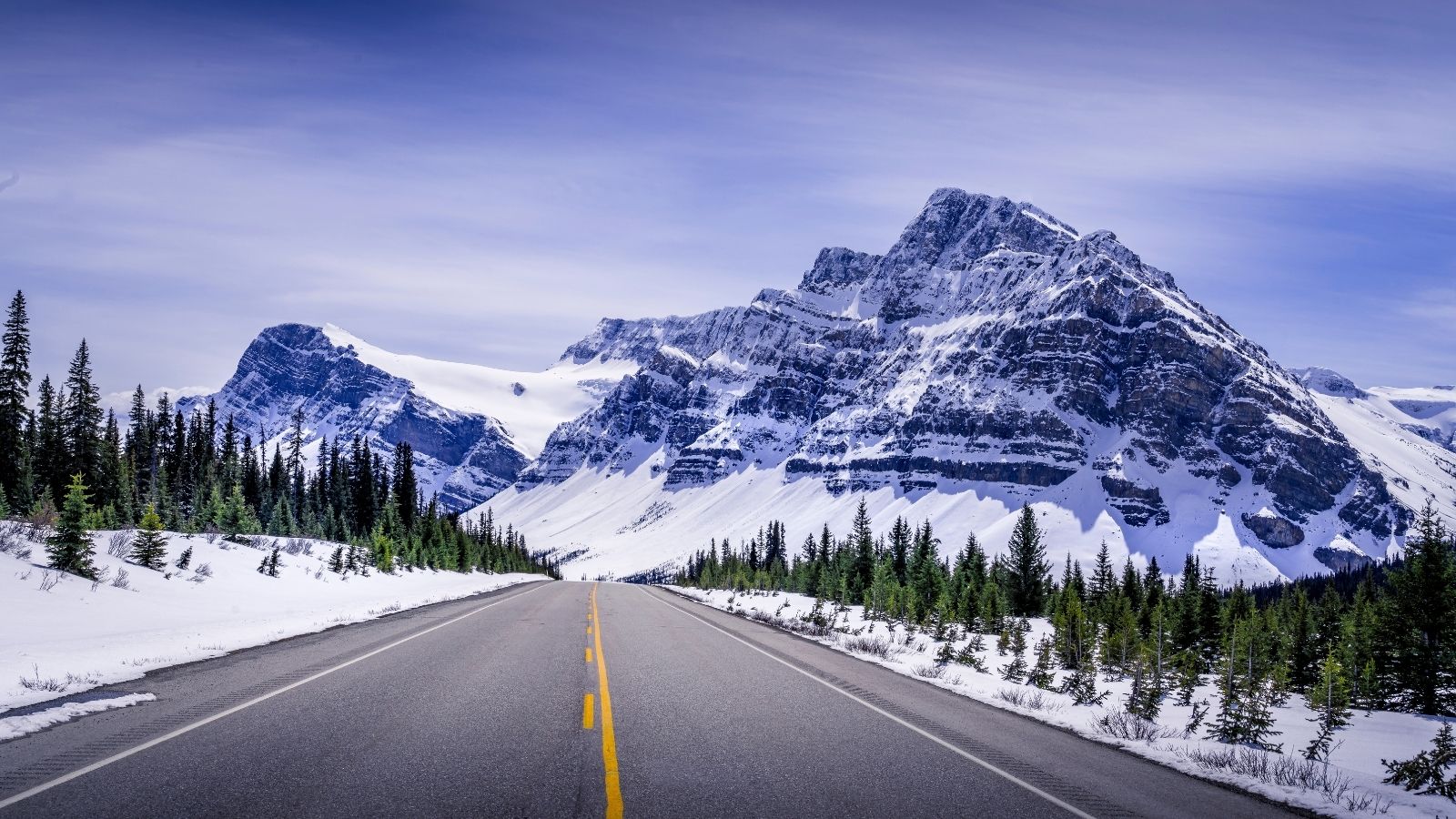 A scenic winter road in the rocky mountains. As Albertans look at the road ahead, it's vital that the mental health landscape be considered.