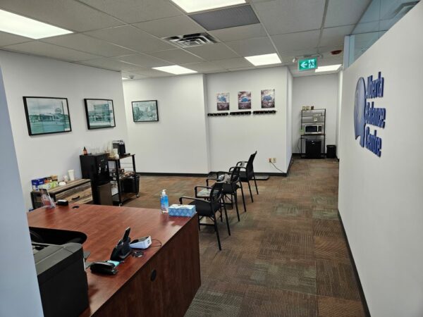 Waiting/reception area viewed from entrance to physio and vestibular exam room.