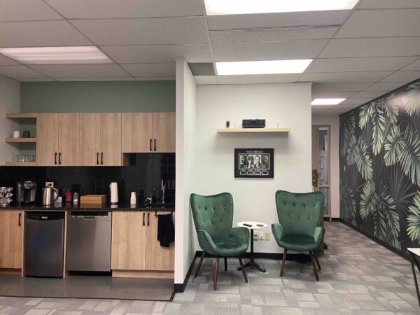 Kitchenette part of waiting area available to clients and practitioners.